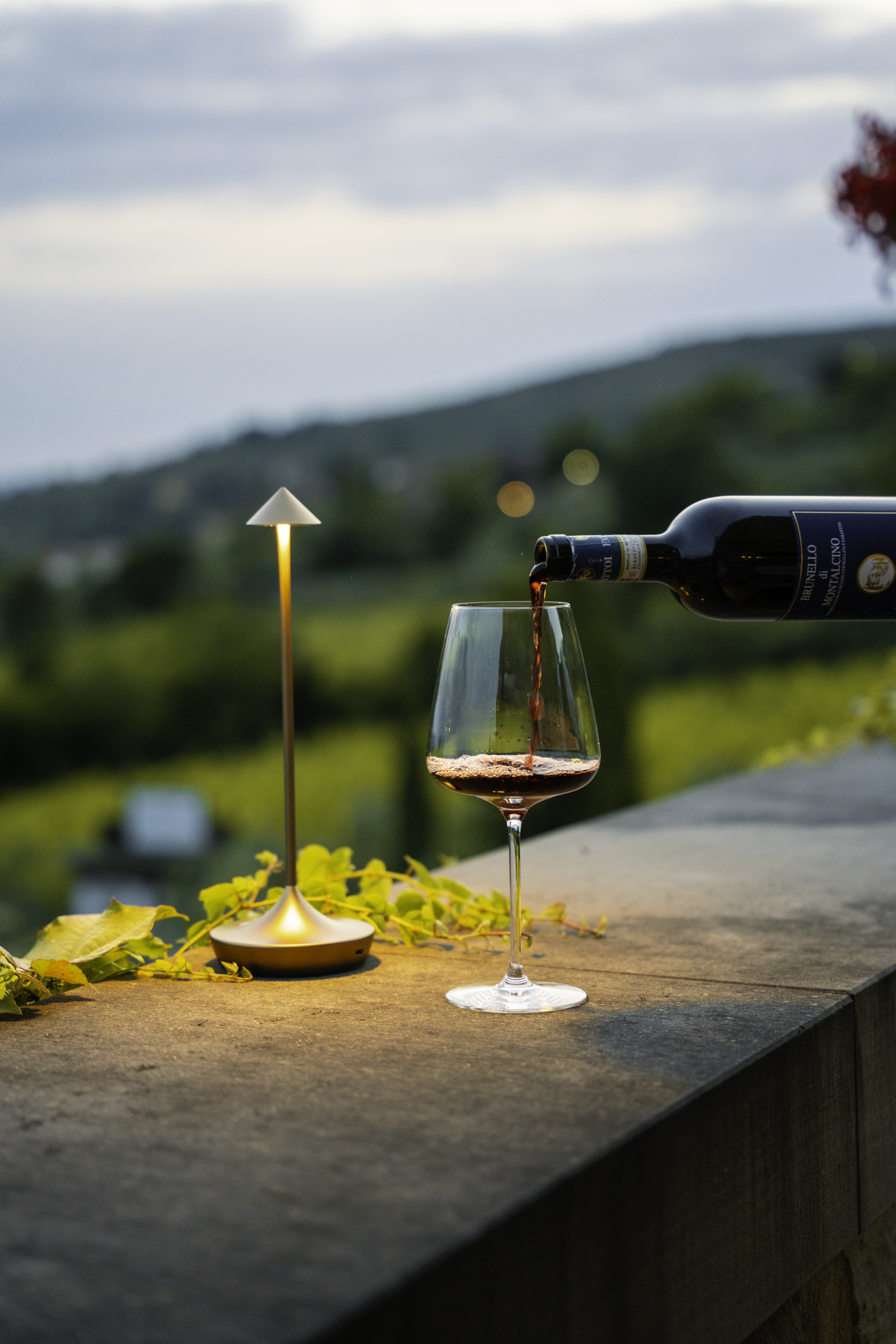 Wine pouring in Tuscan setting